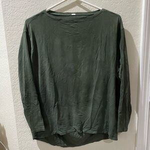 Lululemon green long sleeve floaty but tight on the arms probably a size 6 or 8